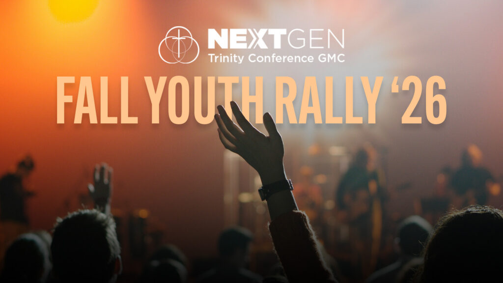 youth hand raised in worship.