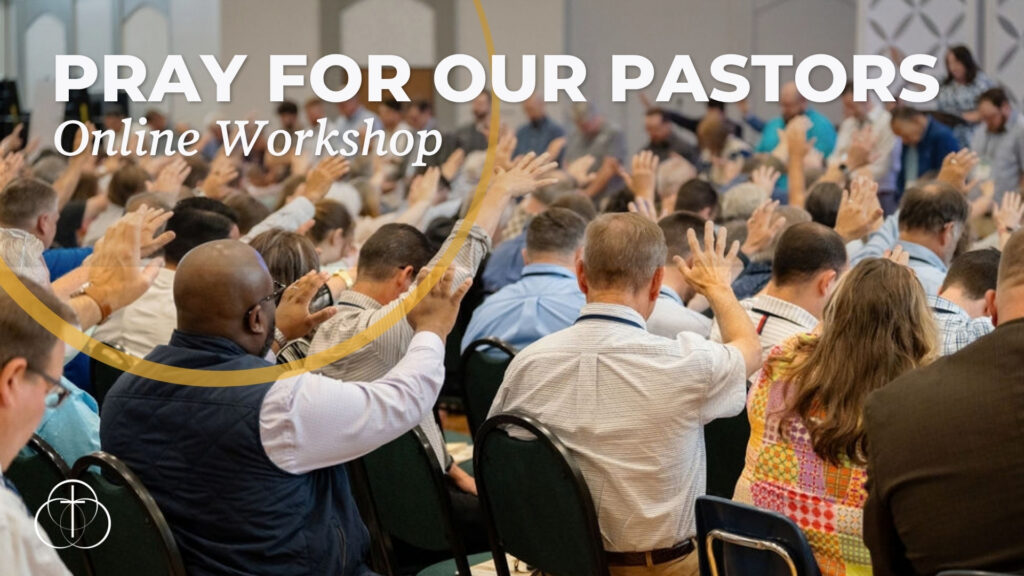 clergy raise their hands in prayer